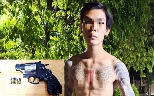 Thanh niên mang súng ngắn cùng 6 viên đạn để phòng thân